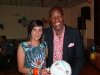 Benno presents a prize to a lucky lady